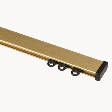 gordijnrails messing brush goud